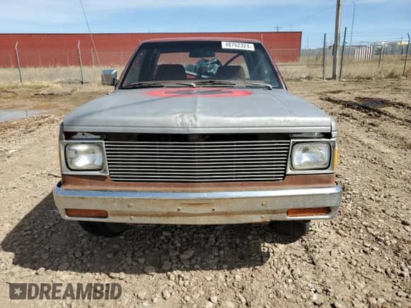 1984 Chevrolet S-10 с VIN 1GCCS14B0E8243194, выставлен на аукционе Copart как лот 48762324 с пробегом Не указан миль и На запчасти • Non repairable. История ставок и продаж доступна на DreamBid. Изображение 5.