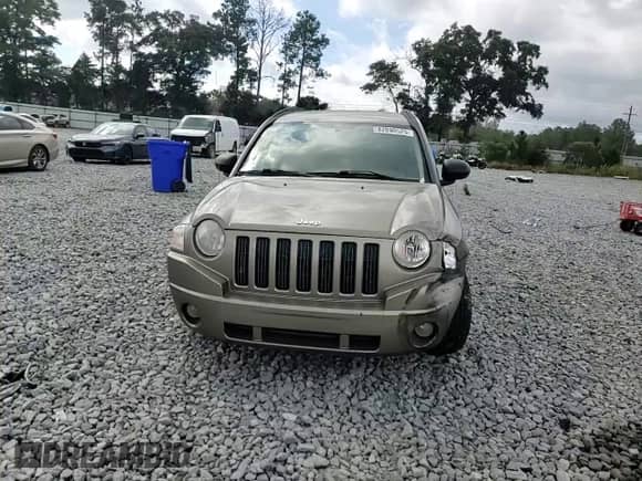 2008 Jeep Compass Sport с VIN 1J8FT47098D660985, выставлен на аукционе Copart как лот 82090525 с пробегом 140 750 миль миль и Списание • Salvage title. История ставок и продаж доступна на DreamBid. Изображение 14.