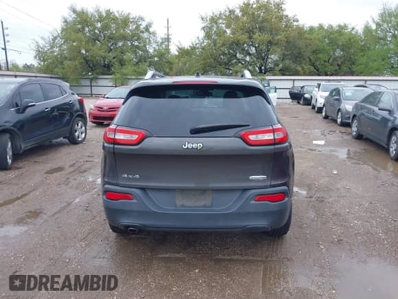 2014 Jeep Cherokee Latitude with VIN 1C4PJMCBXEW250804, listed as a IAAI auction lot 41874944 with 93,171 mi miles and . Bid and sale history available at DreamBid. Image 16.