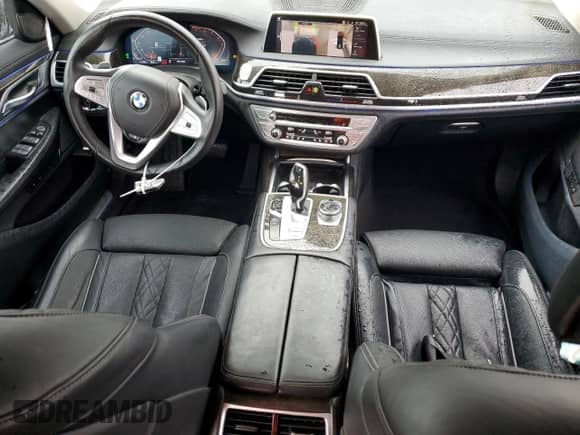 2022 BMW 7 Series 740i xDrive with VIN WBA7T4C06NCJ65806, listed as a Copart auction lot 62710535 with 33,260 mi miles and Salvage title. Bid and sale history available at DreamBid. Image 8.