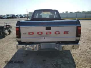 1993 Dodge Dakota z VIN 1B7FL23X3PS167652, wystawiony jako Copart lot #69067224 z przebiegiem 92 113 mil mil oraz Szkoda całkowita • Salvage title. Historia ofert i sprzedaży dostępna na DreamBid. Obrazek 6.