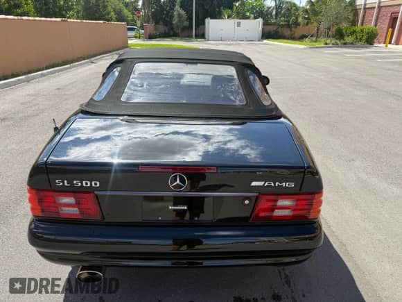 1999 Mercedes-Benz SL 500 with VIN WDBFA68F4XF180902, listed as a Copart auction lot 91220145 with 117,116 mi miles and Clean title. Bid and sale history available at DreamBid. Image 12.