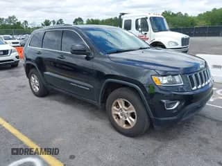 2016 Jeep Grand Cherokee Laredo with VIN 1C4RJEAG0GC320683, listed as a IAAI auction lot 42379025 with 124,750 mi miles and . Bid and sale history available at DreamBid. Image 1.