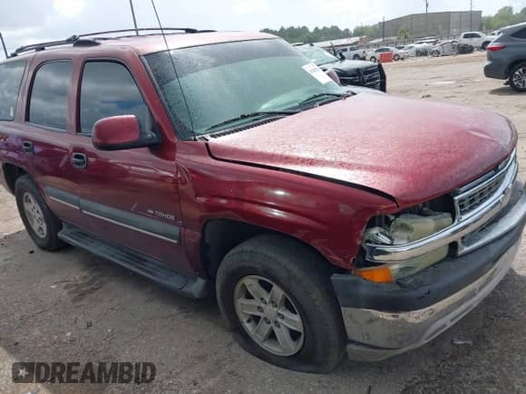 2002 Chevrolet Tahoe LS z VIN 1GNEC13Z12R170421, wystawiony jako IAAI lot #43265316 z przebiegiem 319 576 mil mil oraz . Historia ofert i sprzedaży dostępna na DreamBid. Obrazek 1.
