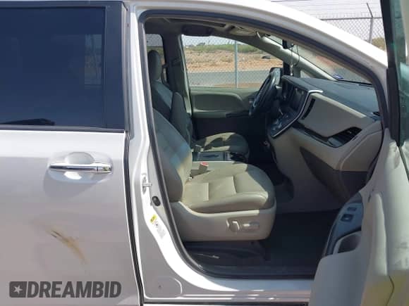 2015 Toyota Sienna XLE with VIN 5TDYK3DC2FS682520, listed as a IAAI auction lot 42501795 with 101,477 mi miles and . Bid and sale history available at DreamBid. Image 5.