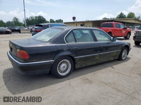 1997 BMW 7 Series 740iL with VIN WBAGJ8328VDM00294, listed as a Copart auction lot 64585595 with Not provided miles and Clean title. Bid and sale history available at DreamBid. Image 3.