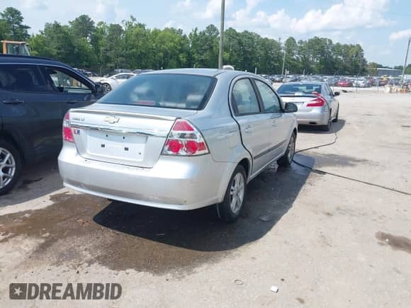 2011 Chevrolet Aveo 1LT with VIN KL1TD5DE9BB134041, listed as a IAAI auction lot 42621873 with 126,035 mi miles and . Bid and sale history available at DreamBid. Image 4.