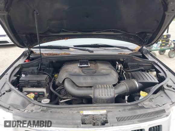 2011 Jeep Grand Cherokee 70th Anniversary with VIN 1J4RR4GG3BC582470, listed as a IAAI auction lot 42138291 with 241,429 mi miles and . Bid and sale history available at DreamBid. Image 10.