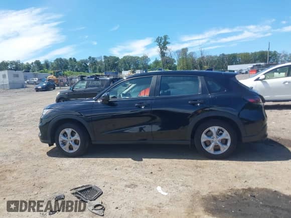 2024 Honda HR-V LX with VIN 3CZRZ2H31RM702906, listed as a IAAI auction lot 42782590 with 148,023 mi miles and . Bid and sale history available at DreamBid. Image 14.