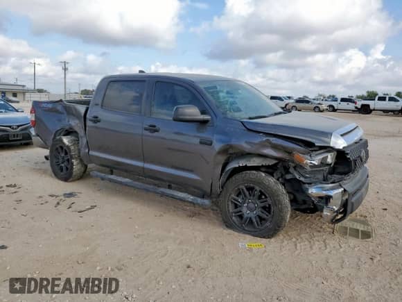 2020 Toyota Tundra SR5 with VIN 5TFDY5F15LX945111, listed as a Copart auction lot 70679165 with 147,342 mi miles and Salvage title. Bid and sale history available at DreamBid. Image 4.