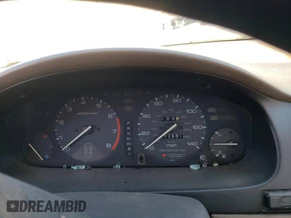 1994 Honda Accord LX z VIN 1HGCD5631RA137411, wystawiony jako Copart lot #76126484 z przebiegiem 212 681 mil mil oraz Szkoda całkowita • Salvage title. Historia ofert i sprzedaży dostępna na DreamBid. Obrazek 9.