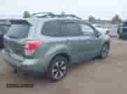 2018 Subaru Forester Premium z VIN JF2SJAEC2JH586302, wystawiony jako IAAI lot #43186549 z przebiegiem 122 233 mil mil oraz . Historia ofert i sprzedaży dostępna na DreamBid. Obrazek 4.