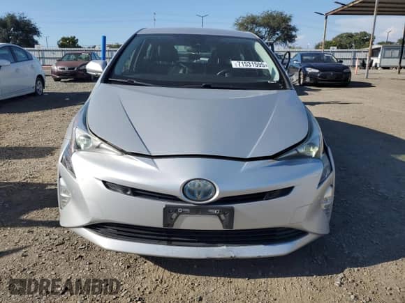 2018 Toyota Prius Two с VIN JTDKARFU6J3550906, выставлен на аукционе Copart как лот 71531595 с пробегом 203 507 миль миль и Списание • Salvage title. История ставок и продаж доступна на DreamBid. Изображение 5.