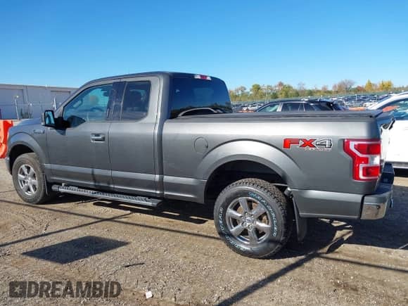 2018 Ford F-150 XL z VIN 1FTFX1EG8JKF78371, wystawiony jako IAAI lot #43545584 z przebiegiem 164 505 mil mil oraz . Historia ofert i sprzedaży dostępna na DreamBid. Obrazek 14.