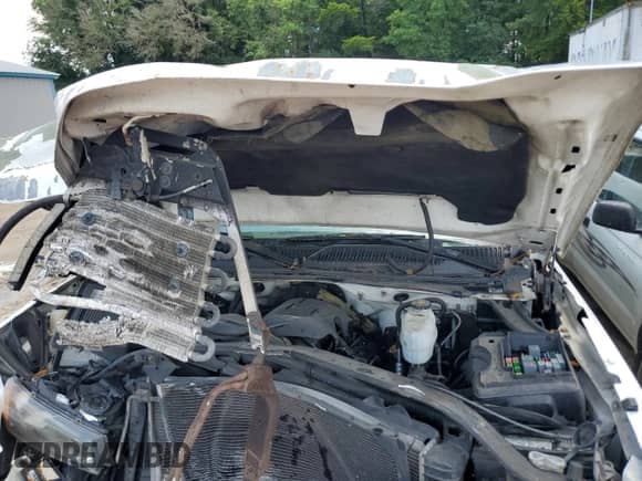 2007 Chevrolet Silverado 2500HD Work Truck z VIN 1GCHC24U47E137765, wystawiony jako Copart lot #58523585 z przebiegiem Nie podano mil oraz Szkoda całkowita • Salvage title. Historia ofert i sprzedaży dostępna na DreamBid. Obrazek 11.