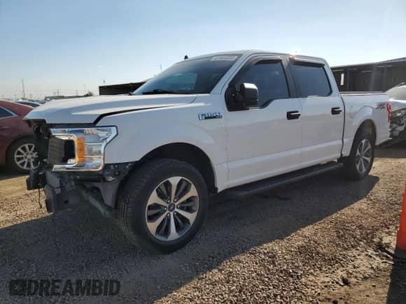 2020 Ford F-150 XL with VIN 1FTEW1CPXLFA15710, listed as a Copart auction lot 61944055 with 98,561 mi miles and Salvage title. Bid and sale history available at DreamBid. Image 1.