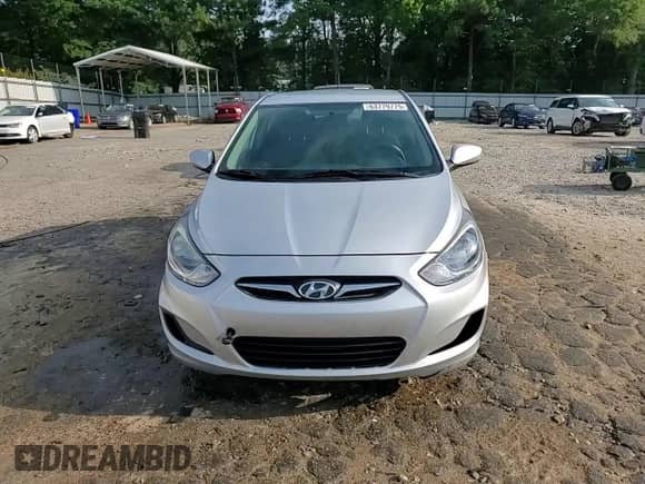 2013 Hyundai Accent GS z VIN KMHCT5AE4DU100415, wystawiony jako Copart lot #63779775 z przebiegiem 102 727 mil mil oraz Szkoda całkowita • Salvage title. Historia ofert i sprzedaży dostępna na DreamBid. Obrazek 13.