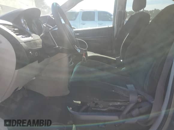 2016 Dodge Grand Caravan SE with VIN 2C4RDGBG9GR237620, listed as a Copart auction lot 70262915 with 178,944 mi miles and Salvage title. Bid and sale history available at DreamBid. Image 7.