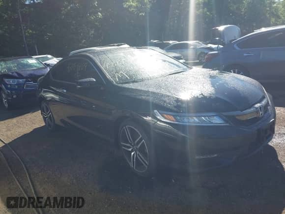 2017 Honda Accord Touring with VIN 1HGCT2B09HA004245, listed as a IAAI auction lot 42289209 with 56,670 mi miles and . Bid and sale history available at DreamBid. Image 1.