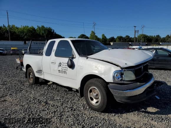 2003 Ford F-150 XL with VIN 1FTRX07WX3KD12915, listed as a Copart auction lot 81296395 with Not provided miles and Salvage title. Bid and sale history available at DreamBid. Image 4.
