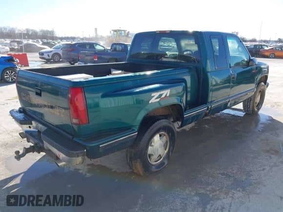 1997 Chevrolet Silverado 1500 with VIN 2GCEK19RXV1115899, listed as a IAAI auction lot 41671682 with 291,289 mi miles and . Bid and sale history available at DreamBid. Image 4.
