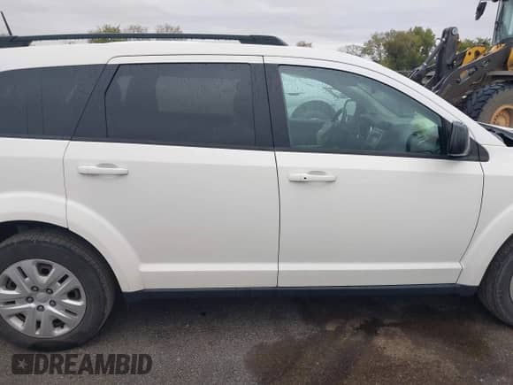 2019 Dodge Journey SE Value with VIN 3C4PDCAB8KT797348, listed as a IAAI auction lot 43378501 with 93,026 mi miles and . Bid and sale history available at DreamBid. Image 13.