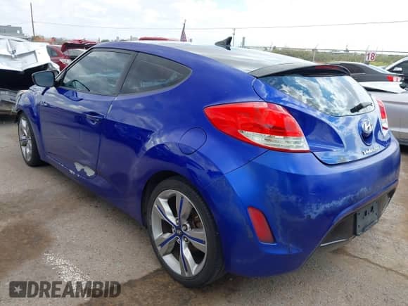2012 Hyundai Veloster w/Black Int с VIN KMHTC6AD8CU067589, выставлен на аукционе IAAI как лот 43408833 с пробегом 159 802 миль миль и . История ставок и продаж доступна на DreamBid. Изображение 3.