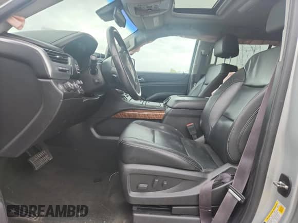 2017 Chevrolet Tahoe Premier with VIN 1GNSKCKC8HR310276, listed as a Copart auction lot 82426675 with 125,835 mi miles and Salvage title. Bid and sale history available at DreamBid. Image 7.