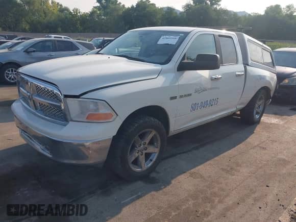 2009 Dodge 1500 SLT with VIN 1D3HV18T79S731610, listed as a IAAI auction lot 42809559 with 305,781 mi miles and . Bid and sale history available at DreamBid. Image 2.