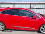 2018 Chevrolet Cruze Premier z VIN 3G1BF6SM9JS534983, wystawiony jako IAAI lot #40311915 z przebiegiem Nie podano mil oraz . Historia ofert i sprzedaży dostępna na DreamBid. Obrazek 13.