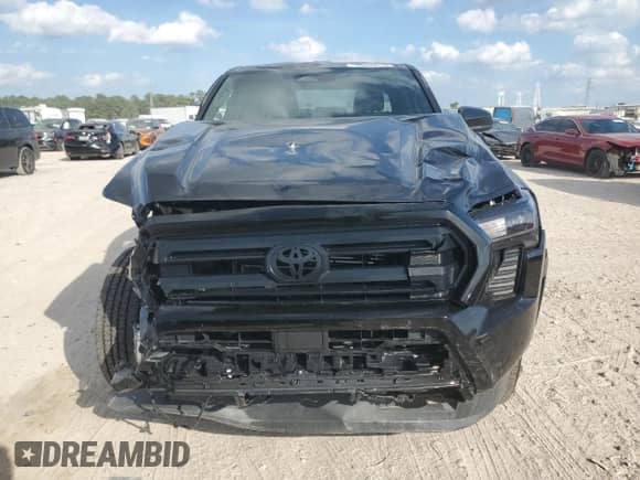2024 Toyota Tacoma SR с VIN 3TYKD5HNXRT015274, выставлен на аукционе Copart как лот 89548525 с пробегом 16 536 миль миль и Списание • Salvage title. История ставок и продаж доступна на DreamBid. Изображение 5.