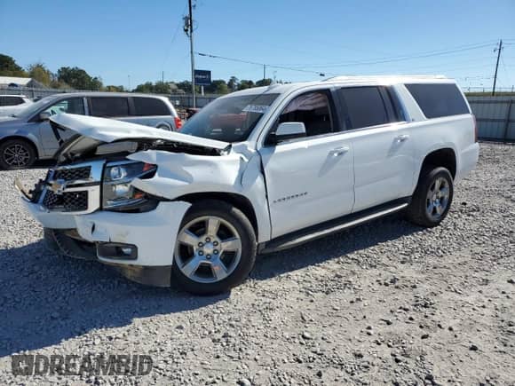 2015 Chevrolet Suburban LT с VIN 1GNSCJKC6FR507851, выставлен на аукционе Copart как лот 80453335 с пробегом Не указан миль и Списание • Salvage title. История ставок и продаж доступна на DreamBid. Изображение 1.