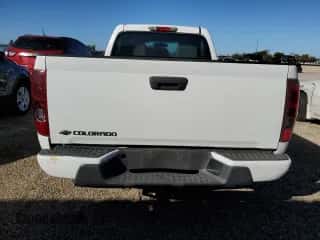 2010 Chevrolet Colorado Work Truck z VIN 1GCCSBD97A8127312, wystawiony jako Copart lot #89442715 z przebiegiem 120 275 mil mil oraz Czysty tytuł • Clean title. Historia ofert i sprzedaży dostępna na DreamBid. Obrazek 6.