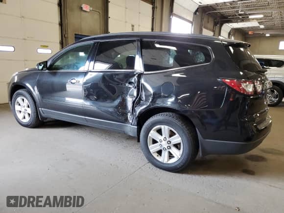 2014 Chevrolet Traverse LT с VIN 1GNKVHKD0EJ346325, выставлен на аукционе Copart как лот 71090205 с пробегом 156 432 миль миль и Списание • Salvage title. История ставок и продаж доступна на DreamBid. Изображение 2.