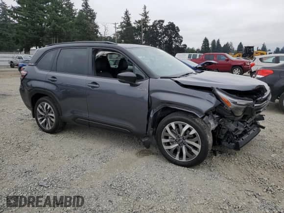 2025 Subaru Forester Touring Hybrid with VIN JF2SLSTD9SH428584, listed as a Copart auction lot 70947465 with 162 mi miles and Salvage title. Bid and sale history available at DreamBid. Image 4.