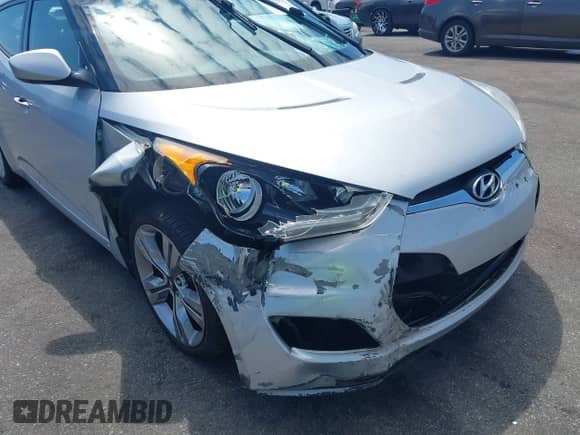 2012 Hyundai Veloster w/Gray Int z VIN KMHTC6AD0CU049684, wystawiony jako IAAI lot #43132772 z przebiegiem 114 146 mil mil oraz . Historia ofert i sprzedaży dostępna na DreamBid. Obrazek 6.