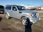 2010 Dodge Nitro SXT with VIN 1D4PT5GK5AW106990, listed as a Copart auction lot 88719415 with 193,019 mi miles and Salvage title. Bid and sale history available at DreamBid. Image 4.