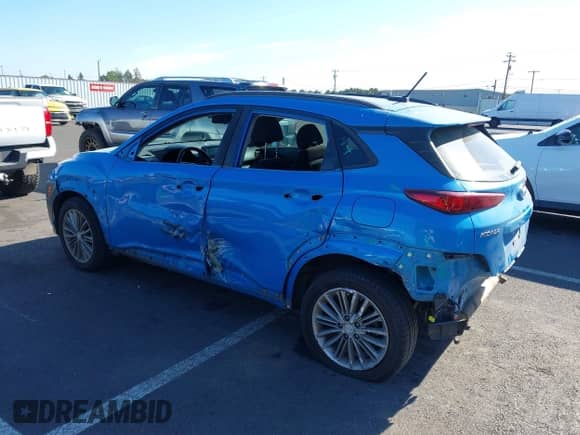 2018 Hyundai Kona SEL z VIN KM8K6CAA5JU148747, wystawiony jako IAAI lot #42974451 z przebiegiem 92 209 mil mil oraz . Historia ofert i sprzedaży dostępna na DreamBid. Obrazek 3.
