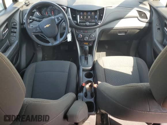 2021 Chevrolet Trax LS with VIN KL7CJNSB2MB349447, listed as a Copart auction lot 62427495 with 57,330 mi miles and Salvage title. Bid and sale history available at DreamBid. Image 8.