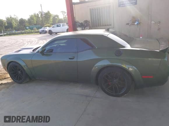 2019 Dodge Challenger SRT Hellcat Redeye Widebody with VIN 2C3CDZL99KH550770, listed as a IAAI auction lot 42827961 with 69,799 mi miles and . Bid and sale history available at DreamBid. Image 14.