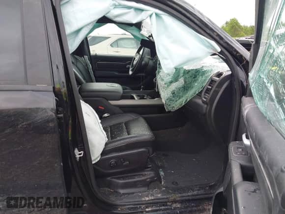 2022 Ram 1500 Rebel z VIN 1C6SRFLT2NN398031, wystawiony jako IAAI lot #42576867 z przebiegiem 36 344 mil mil oraz . Historia ofert i sprzedaży dostępna na DreamBid. Obrazek 5.