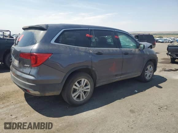 2018 Honda Pilot LX с VIN 5FNYF6H14JB031076, выставлен на аукционе Copart как лот 68305285 с пробегом 153 677 миль миль и Списание • Salvage title. История ставок и продаж доступна на DreamBid. Изображение 3.