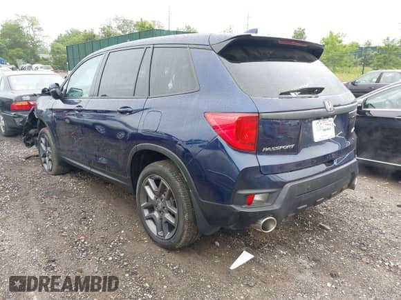 2022 Honda Passport EX-L with VIN 5FNYF8H52NB010909, listed as a IAAI auction lot 42439973 with 24,696 mi miles and . Bid and sale history available at DreamBid. Image 3.