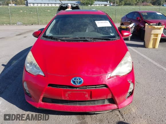 2014 Toyota Prius One z VIN JTDKDTB37E1072885, wystawiony jako IAAI lot #43507602 z przebiegiem Nie podano mil oraz . Historia ofert i sprzedaży dostępna na DreamBid. Obrazek 6.