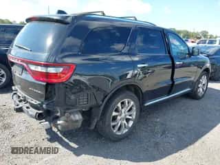2016 Dodge Durango Citadel with VIN 1C4RDJEG0GC370090, listed as a IAAI auction lot 43245951 with 129,152 mi miles and . Bid and sale history available at DreamBid. Image 4.