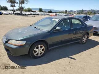 2000 Honda Accord SE with VIN JHMCG6690YC017973, listed as a Copart auction lot 69587415 with 208,111 mi miles and Clean title. Bid and sale history available at DreamBid. Image 1.