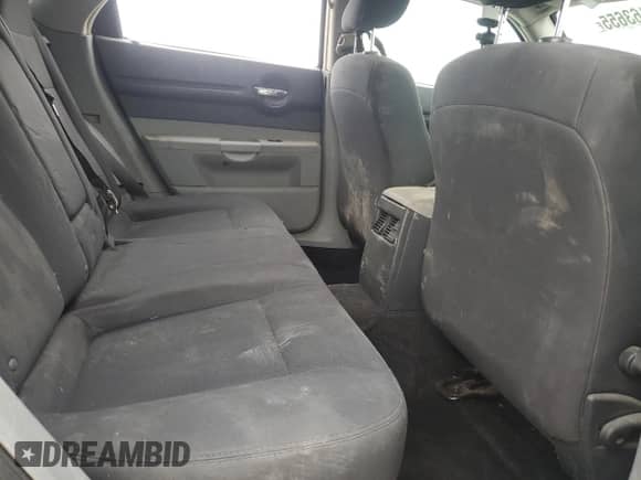 2007 Dodge Magnum Police z VIN 2D4GV47277H864616, wystawiony jako Copart lot #81163655 z przebiegiem 144 757 mil mil oraz Szkoda całkowita • Salvage title. Historia ofert i sprzedaży dostępna na DreamBid. Obrazek 11.