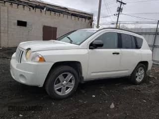 2007 Jeep Compass Sport with VIN 1J8FT47W17D212145, listed as a Copart auction lot 52424795 with 189,310 mi miles and Salvage title. Bid and sale history available at DreamBid. Image 1.