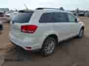 2014 Dodge Journey SXT with VIN 3C4PDDBG1ET143215, listed as a IAAI auction lot 42944174 with 180,579 mi miles and . Bid and sale history available at DreamBid. Image 4.