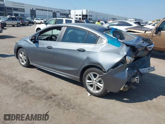 2018 Chevrolet Cruze LT with VIN 1G1BE5SM8J7155517, listed as a IAAI auction lot 43233777 with 114,590 mi miles and . Bid and sale history available at DreamBid. Image 3.